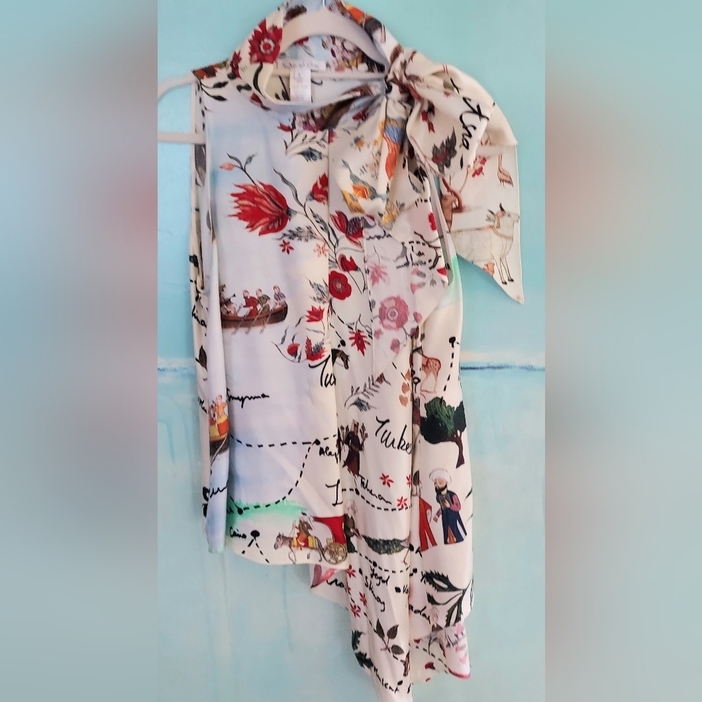 ○$1,990 OSCAR DE LA RENTA FLORAL SILK BOW BLOUSE 8